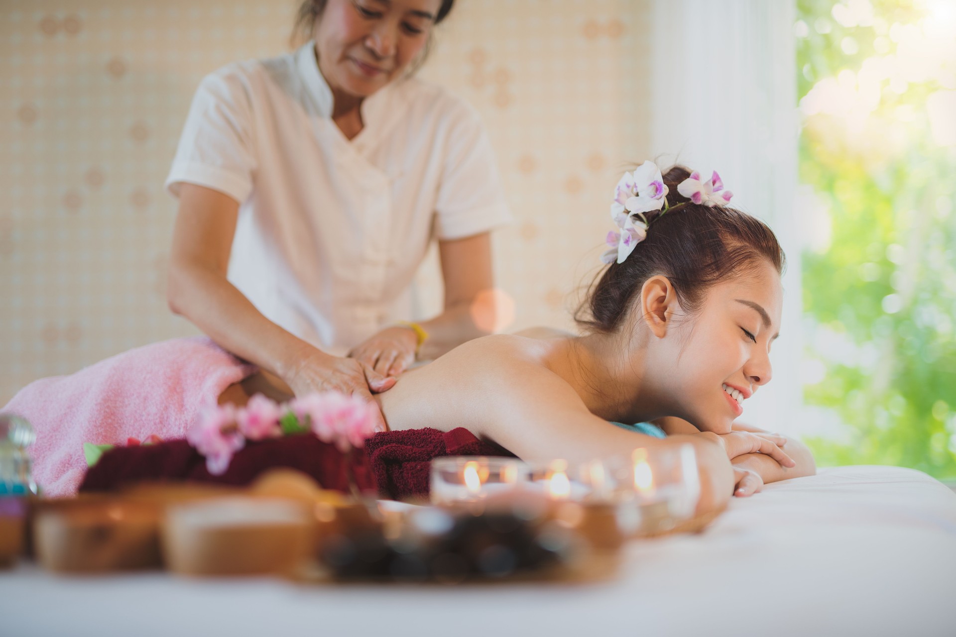 Asian lady relax in skin care aroma therapy and  scrub spa