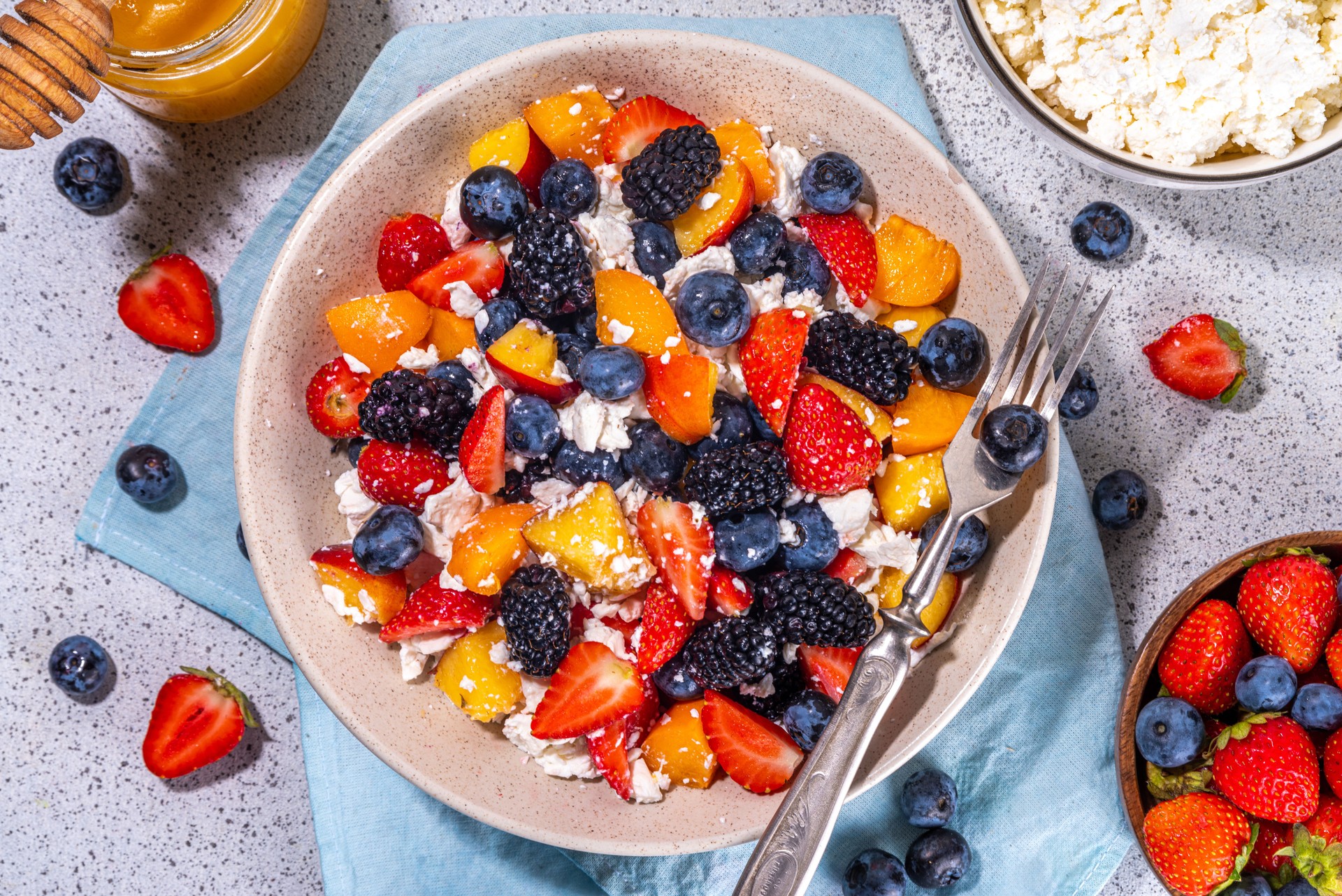 Summer fruit and berry salad with cottage cheese