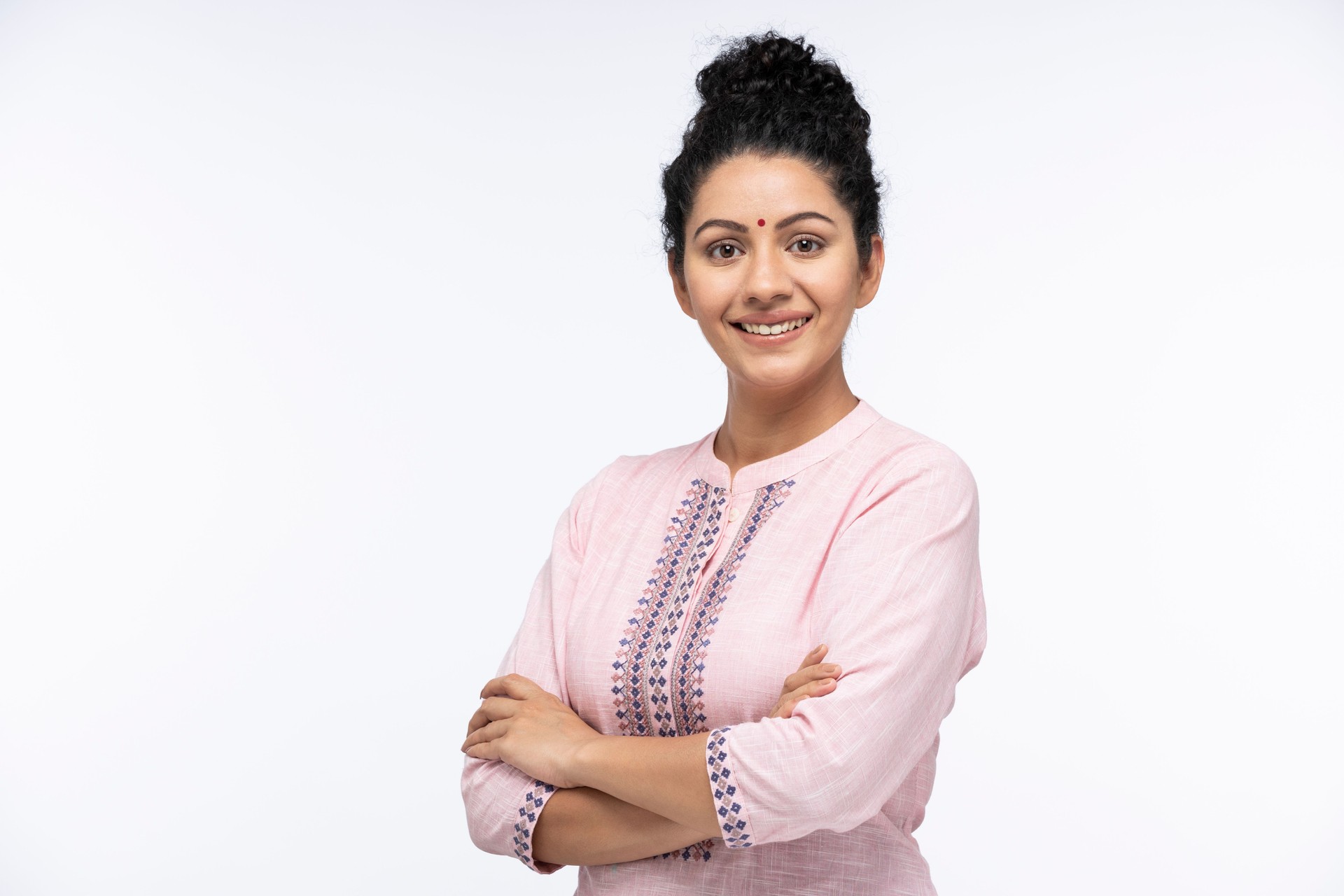 portrait of a young women standing isolated over white background:- stock photo